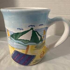 Fripp Island collectible ceramic mug featuring a hand-painted sailboat design.